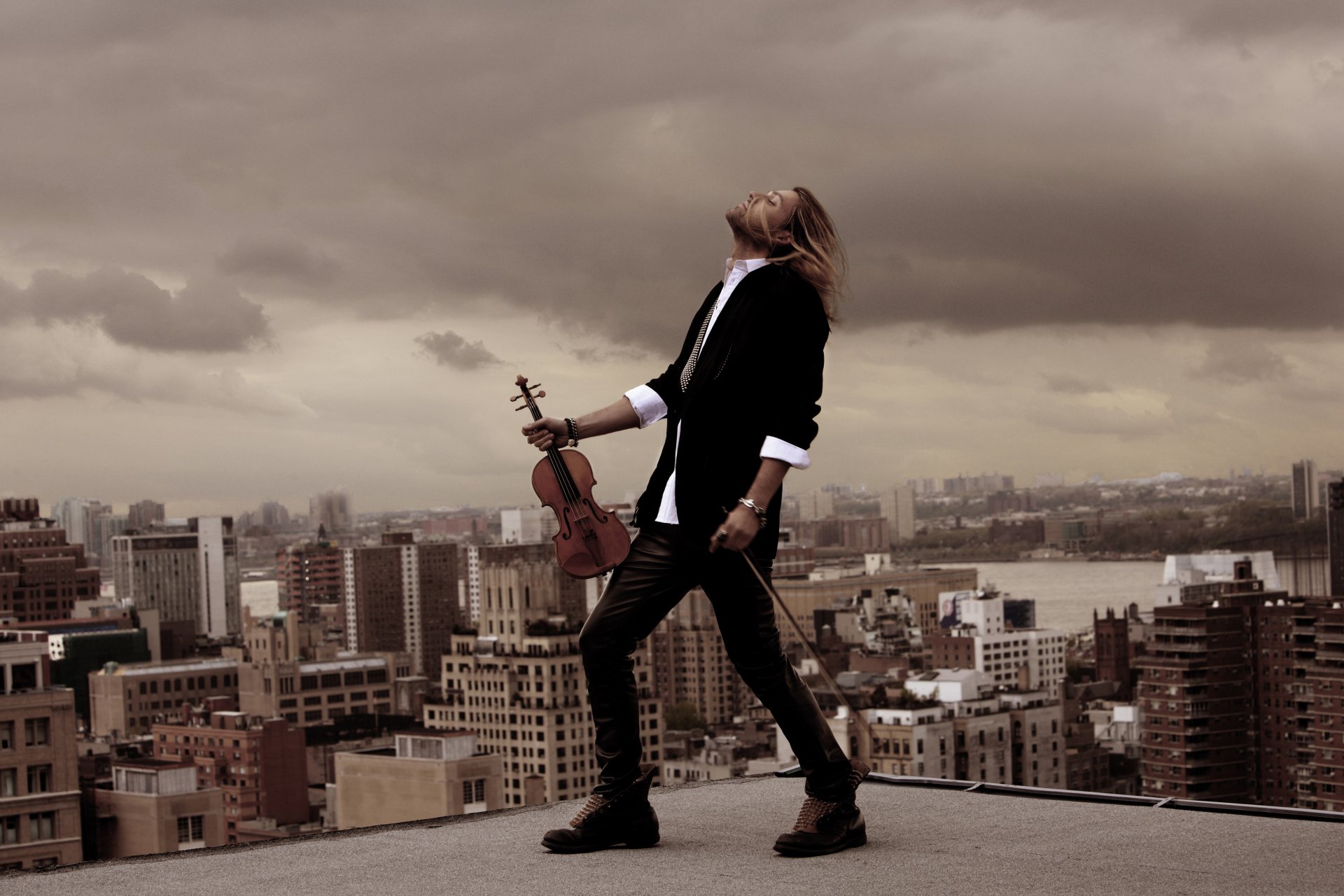 david garrett musician violinist violin wind hair roof buildings moment costume