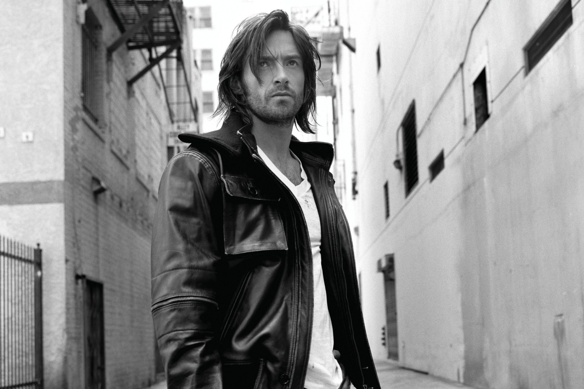 hugh jackman actor man men leather jacket white jersey hair view black-and-white photo