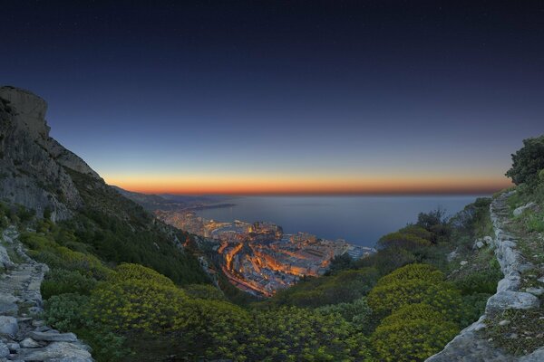 City at sunset by the sea