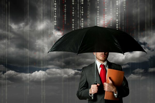 A business man hides under an umbrella from the flow of information