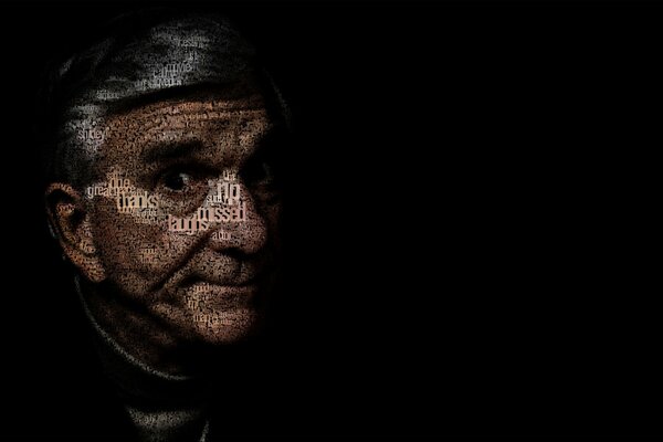 Comedian Leslie Nielsen on a black background