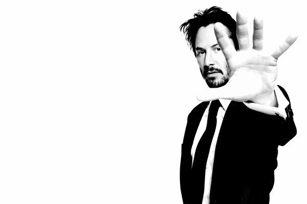 Black and white photo of Keanu Reeves