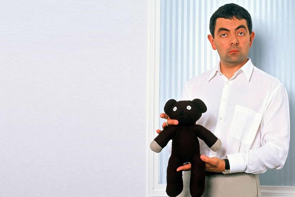 Teddy bear is flattened by Mr. Bean