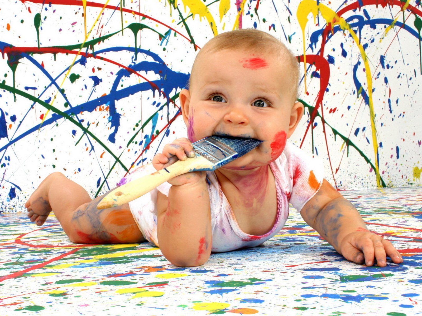 men paint child