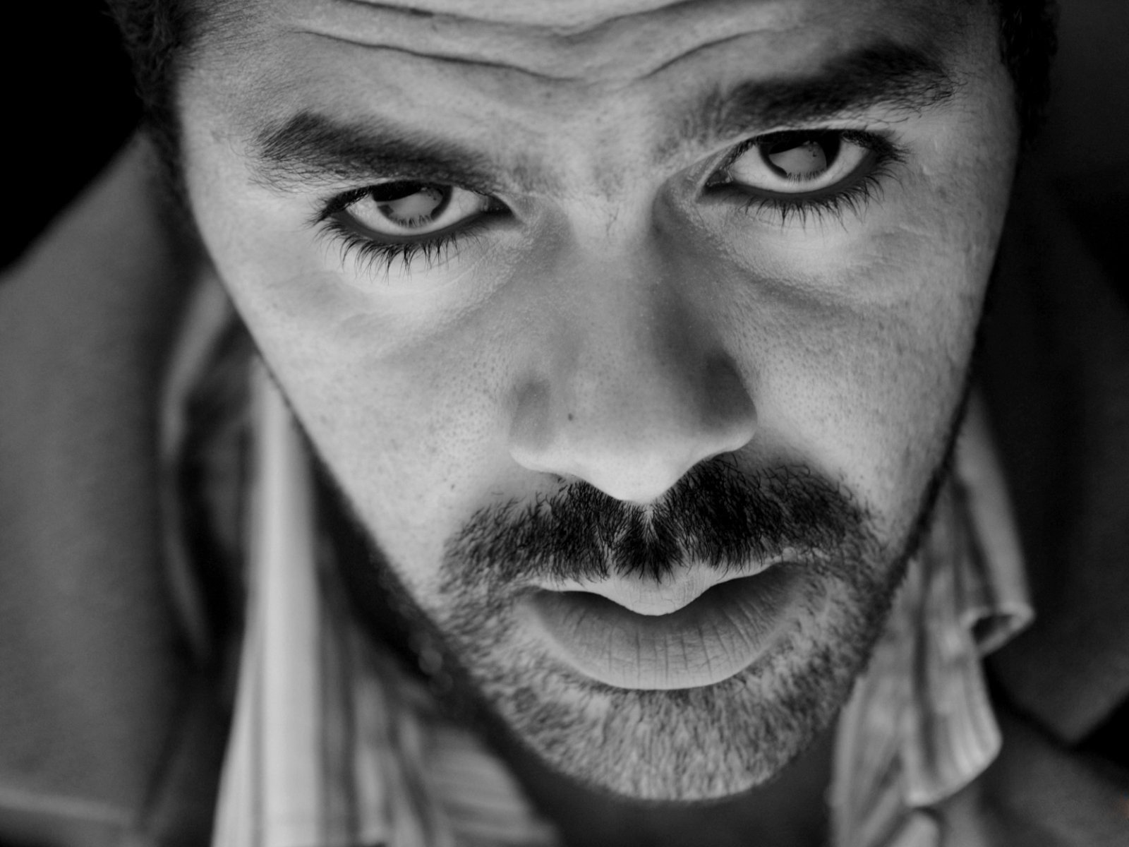 debbuz jamel debbuz actor beard look eyes face black and white