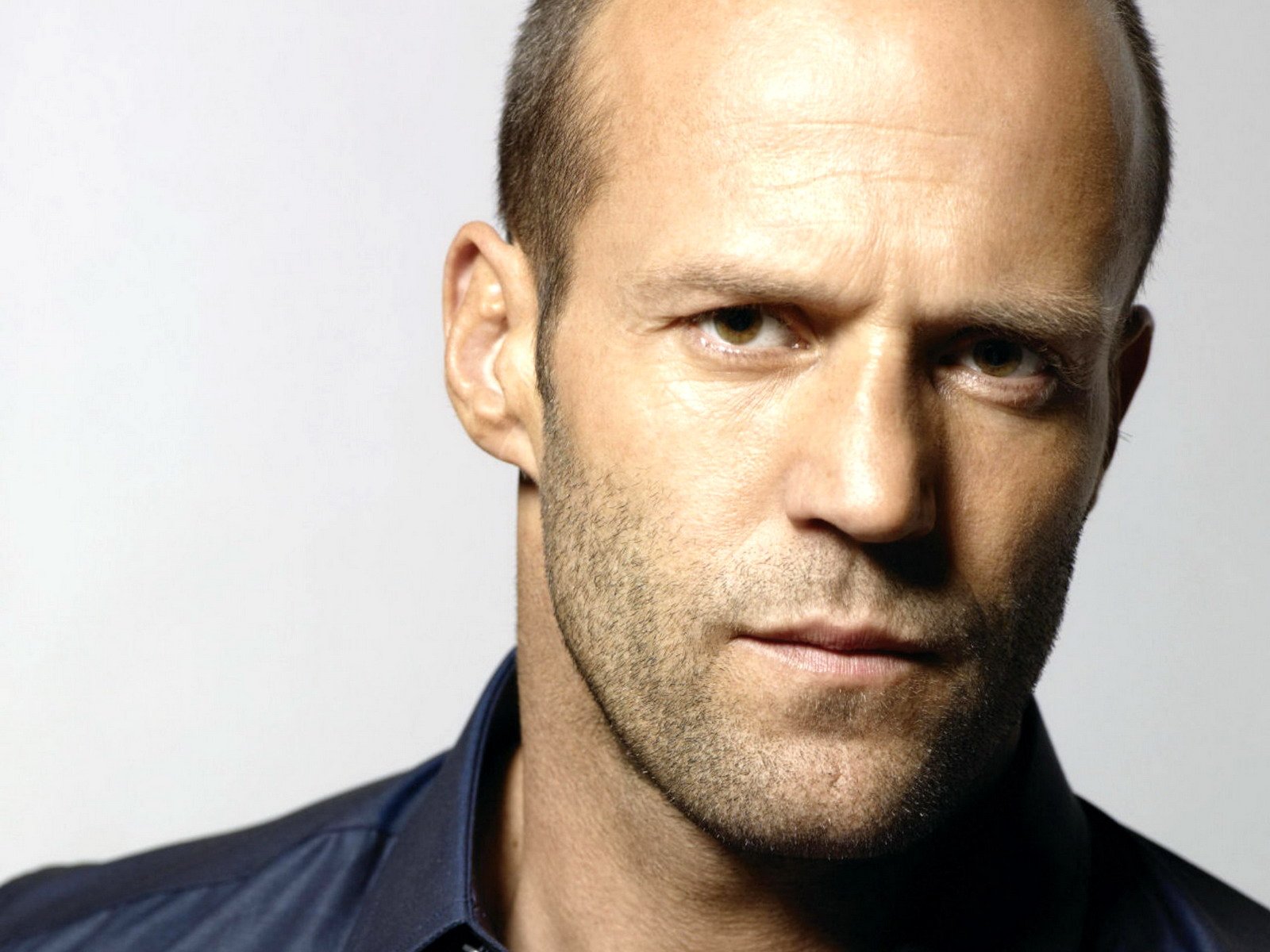 jason statham face view bristle