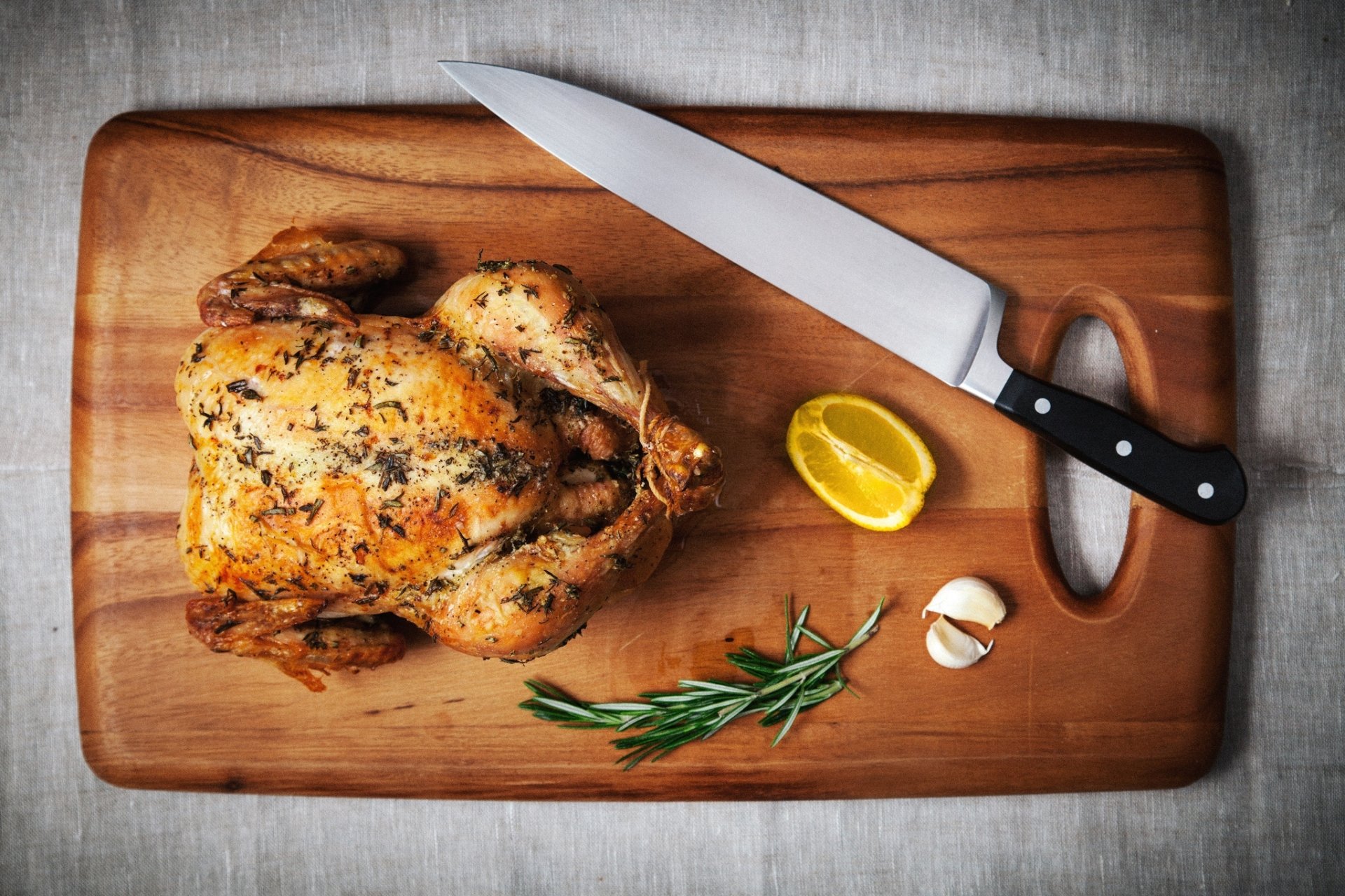 chicken grill knife lemon garlic cutting board