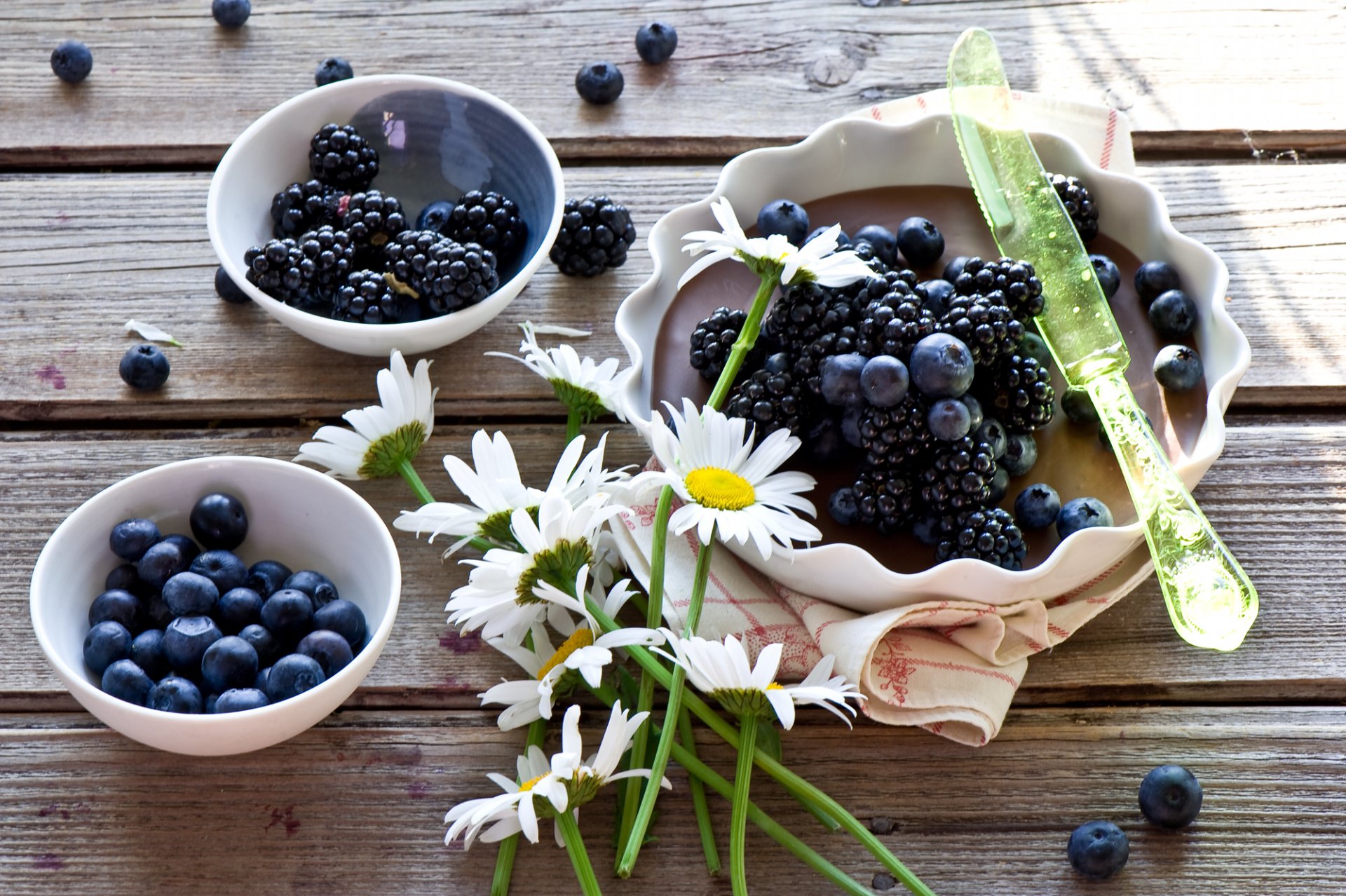 cake berries blackberry blueberries chamomile flower knife