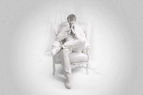 Armin van Buuren in a white suit