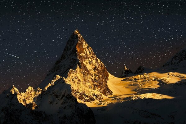 Mountain peak in the moonlight