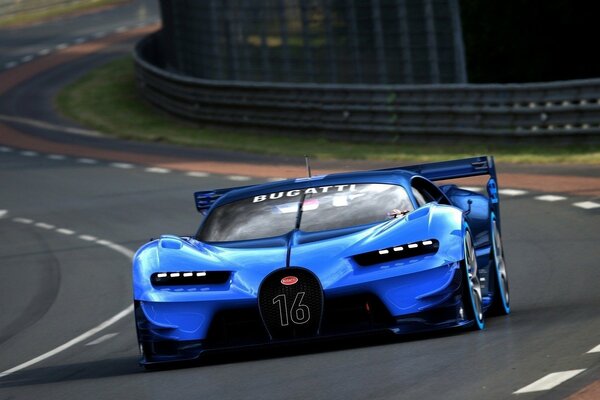 The blue bugatti enters the turn