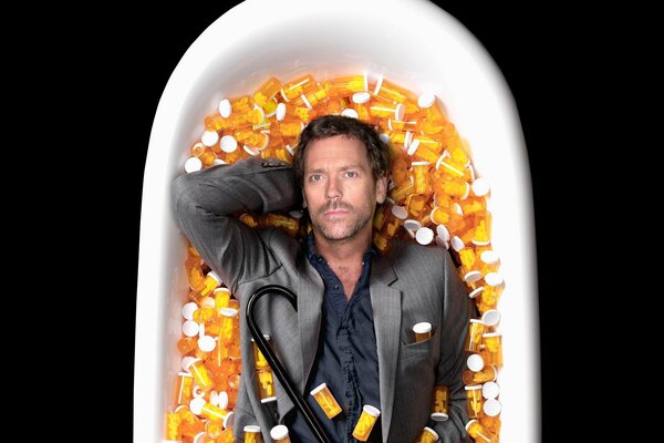 There s a man lying in the bathroom among the pills