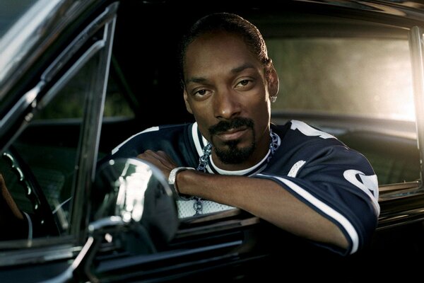 Rapper Snoop Dogg in the car