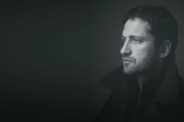 Actor Gerard Butler grey background