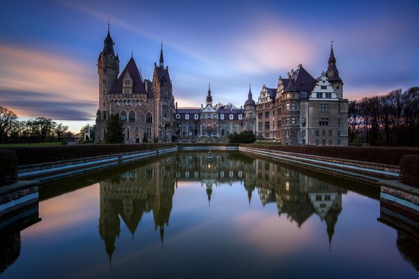 There is a very beautiful pond in Poland at dawn