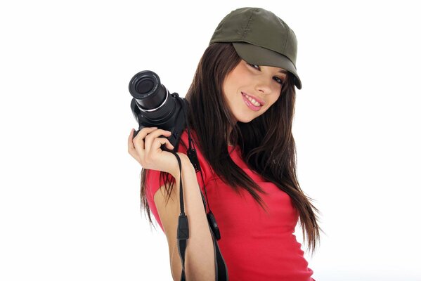 Smiling photographer girl in red