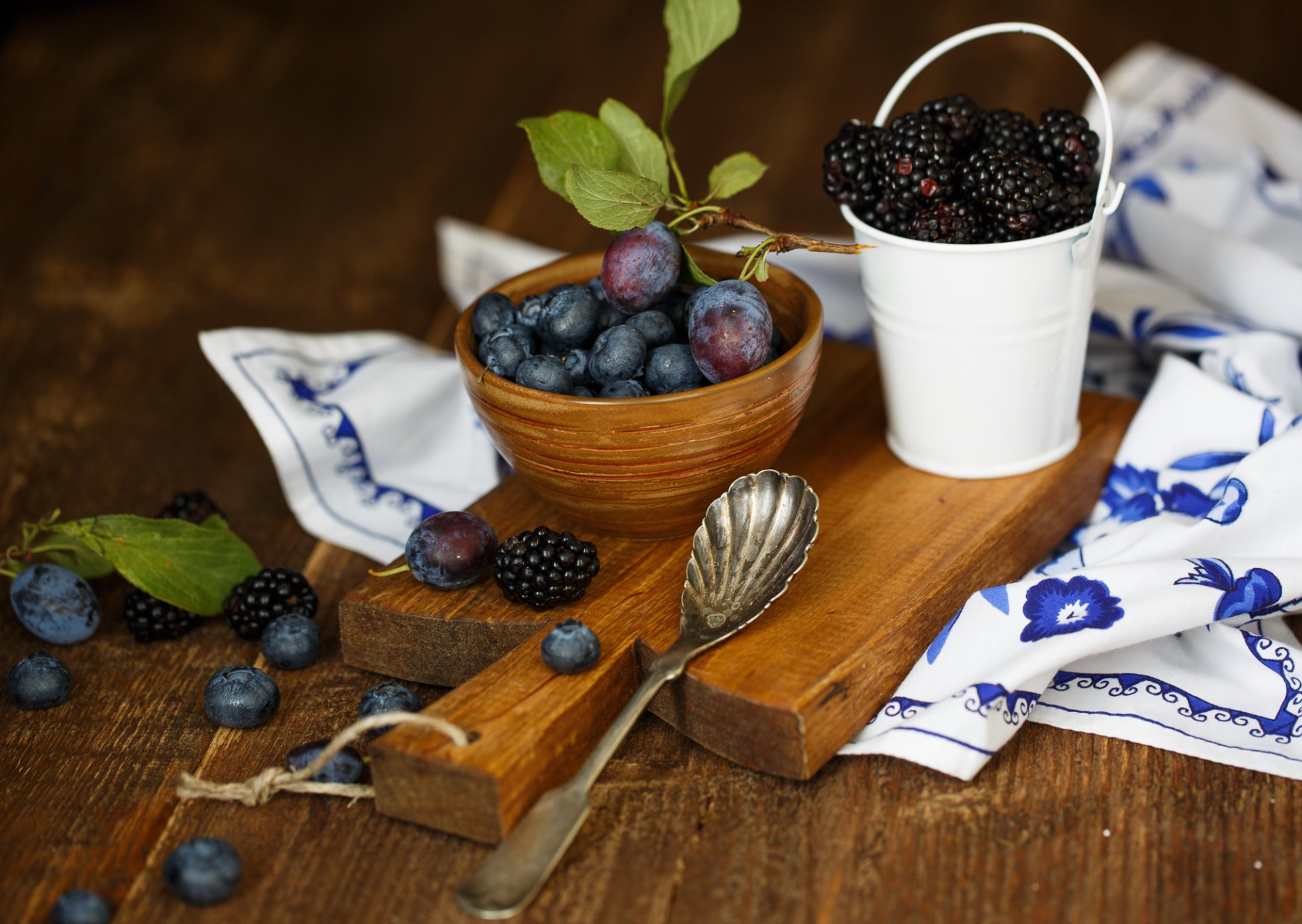 plum blueberries blackberry berries fruits spoon tableware board