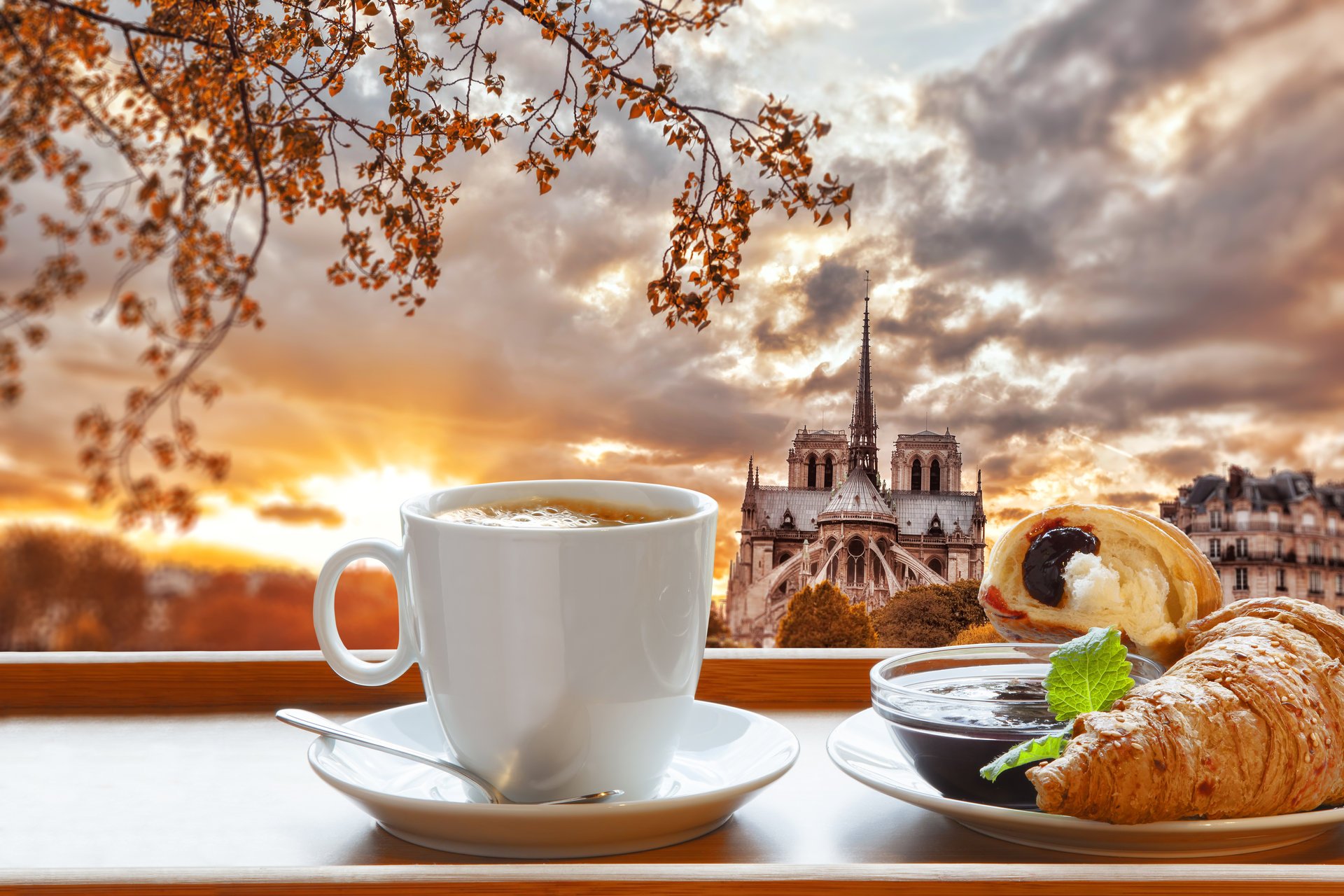 breakfast coffee cup paris france notre dame cathedral croissant jam notre dame