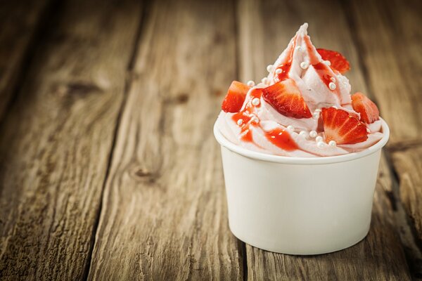 Strawberry ice cream with fresh berries