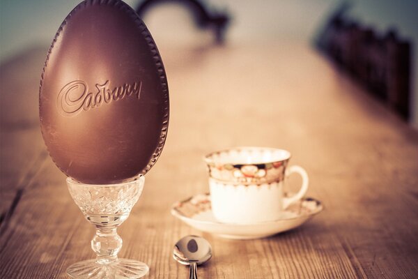 Chocolate egg on a crystal stand