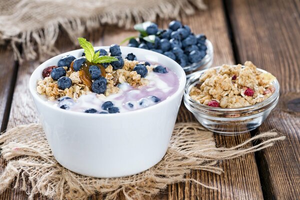 Dessert of fresh berries in yogurt with muesli
