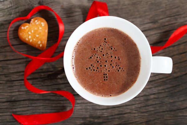 Weihnachtsstimmung mit einer Tasse duftenden Kaffee