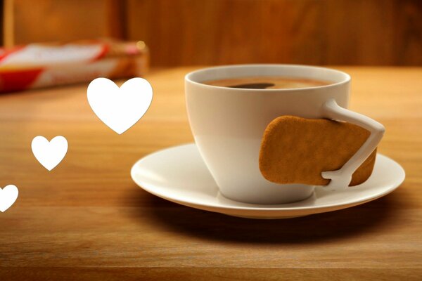 Tasse de café noir frais et parfumé avec des biscuits