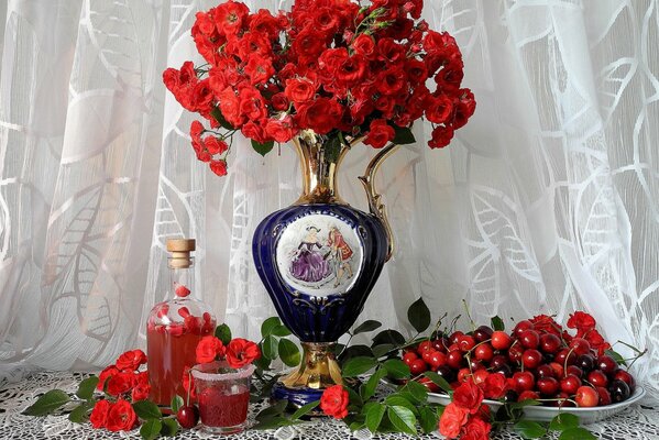 Still life of berries and flowers on tulle