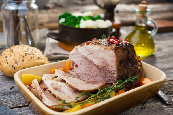 Delicious baked meat on a baking sheet