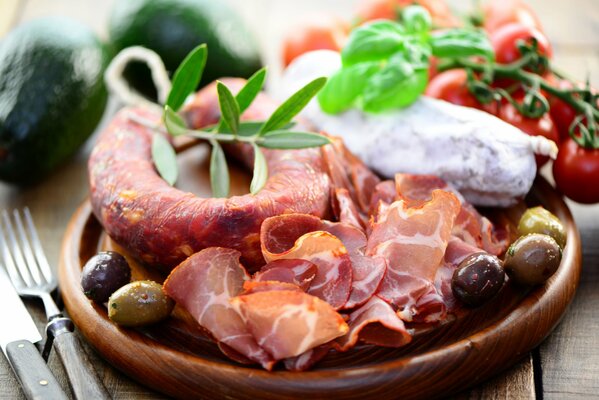 Photos with meat products and vegetables on a plate