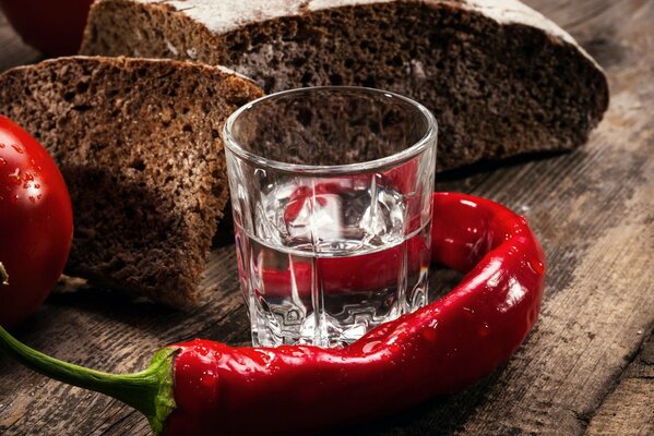 Spicy Borodino bread and a glass of vodka