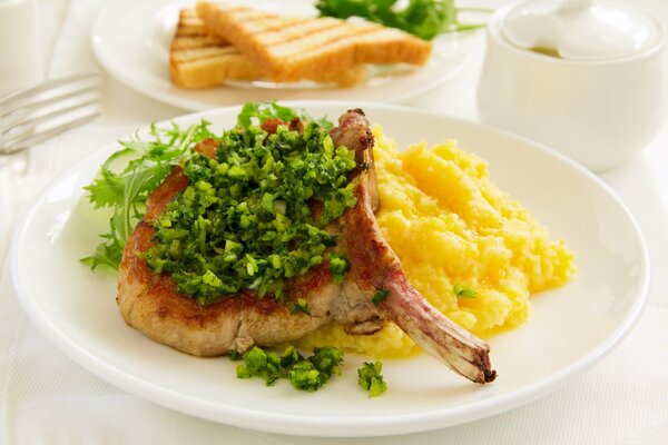 Bone-in steak with mashed potatoes