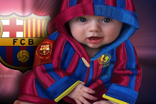 Pequeño aficionado del FC Barcelona. Niño Fan
