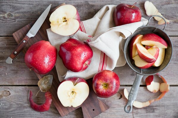 Ripe red apples on the table