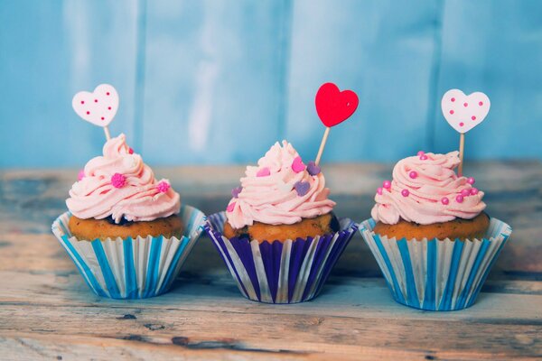 Festive muffins. Desserts decorated with hearts