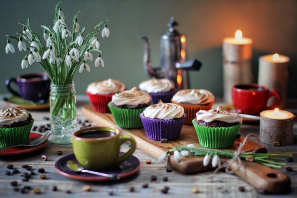 Tea party with cupcakes by candlelight