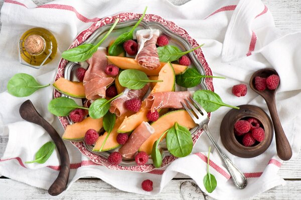 Light salad with melon and meat