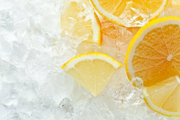 Lemon and orange slices on ice