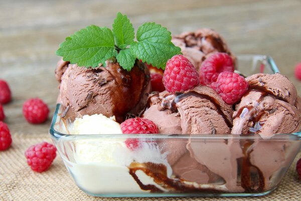 Ice cream decorated with raspberries