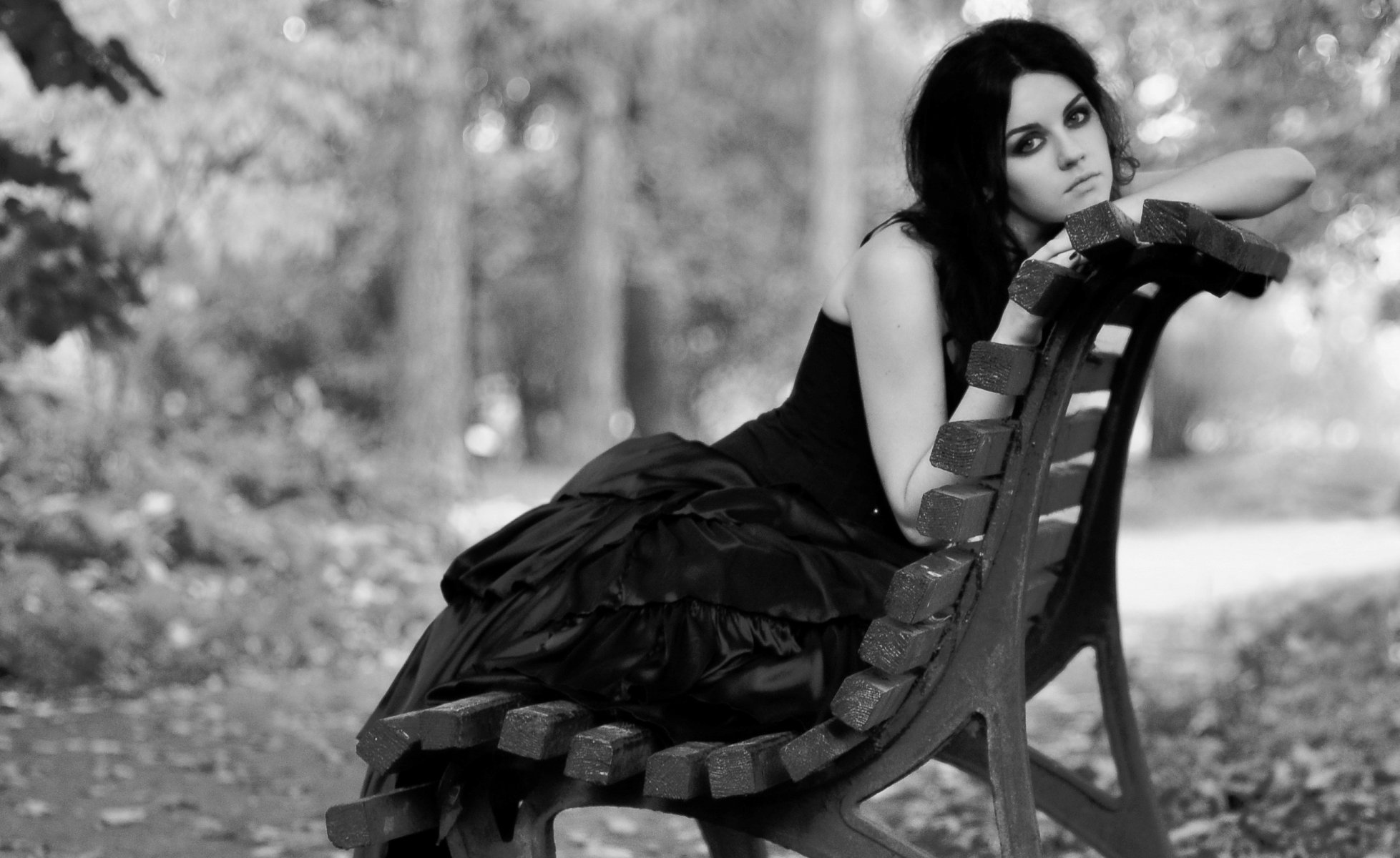 girl brunette dress pose view bench park black and white