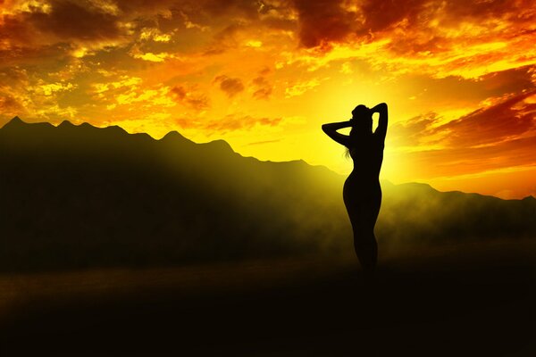 A girl at sunset against the background of mountains