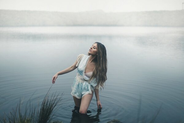 Morning and a girl in the water