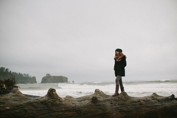 A girl on the ocean alone