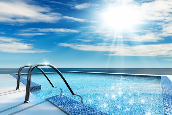 The alluring crystal-clear water of the pool is just the thing on a hot day