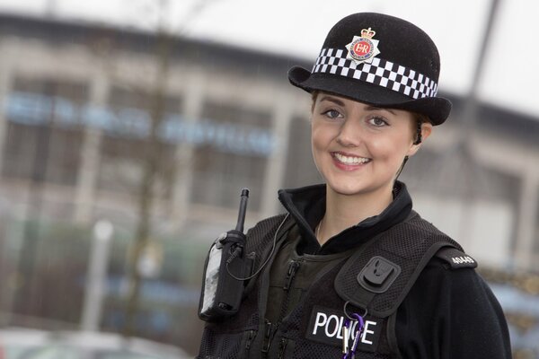 A girl in a police uniform, a constable