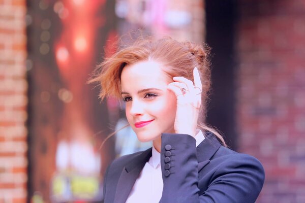 Portrait of Emma Watson with her hair gathered