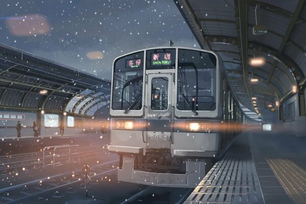 A train leaving the station in a snowfall