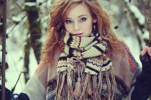 Winter photography of a blue-eyed girl