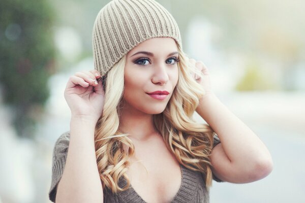 Cute Sandra in a beanie on a cloudy background