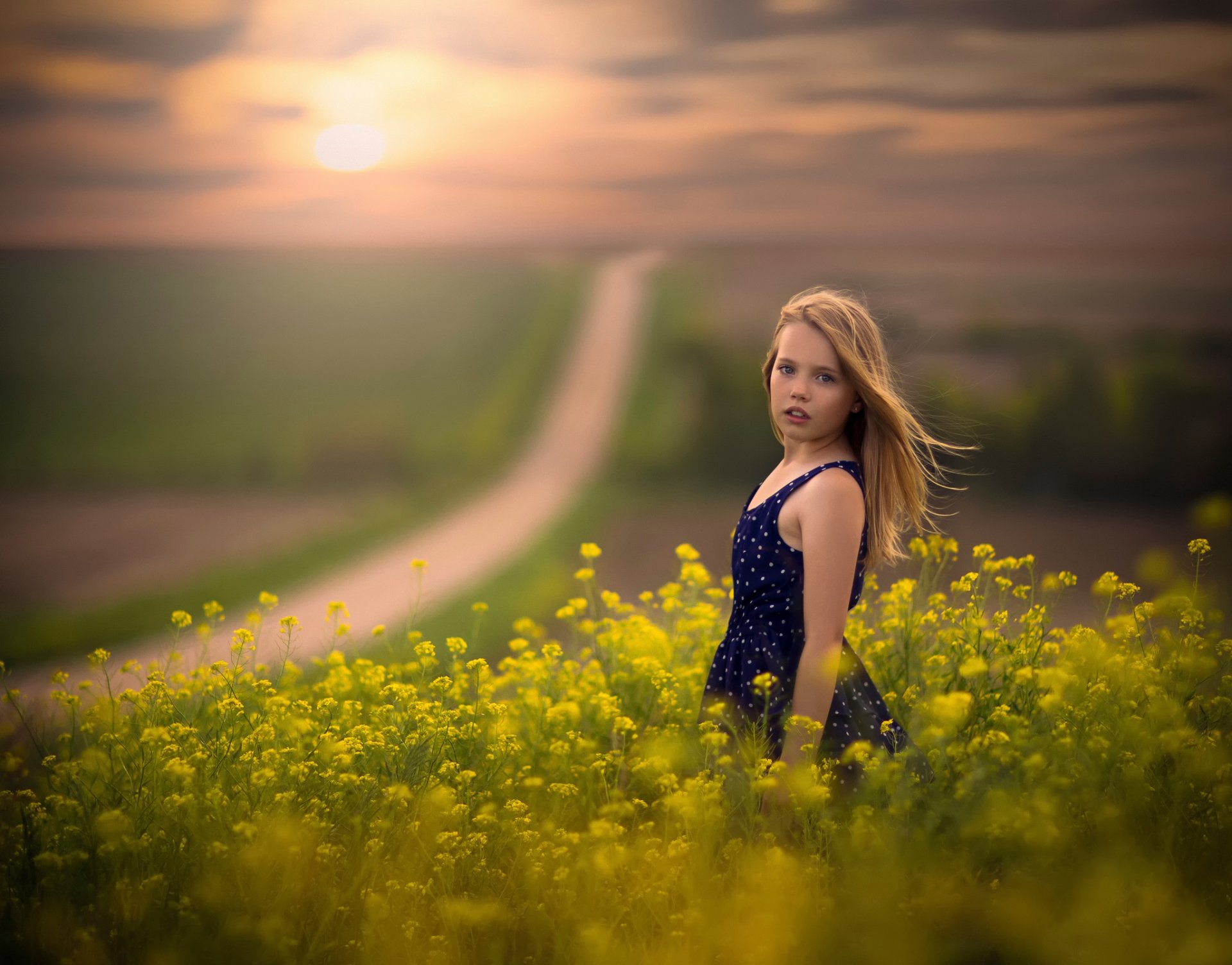 girl wind the field road space bokeh